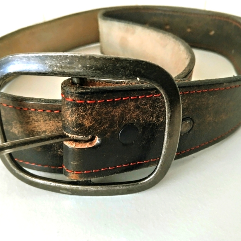 Beautiful handmade rawhide faded belt. Large